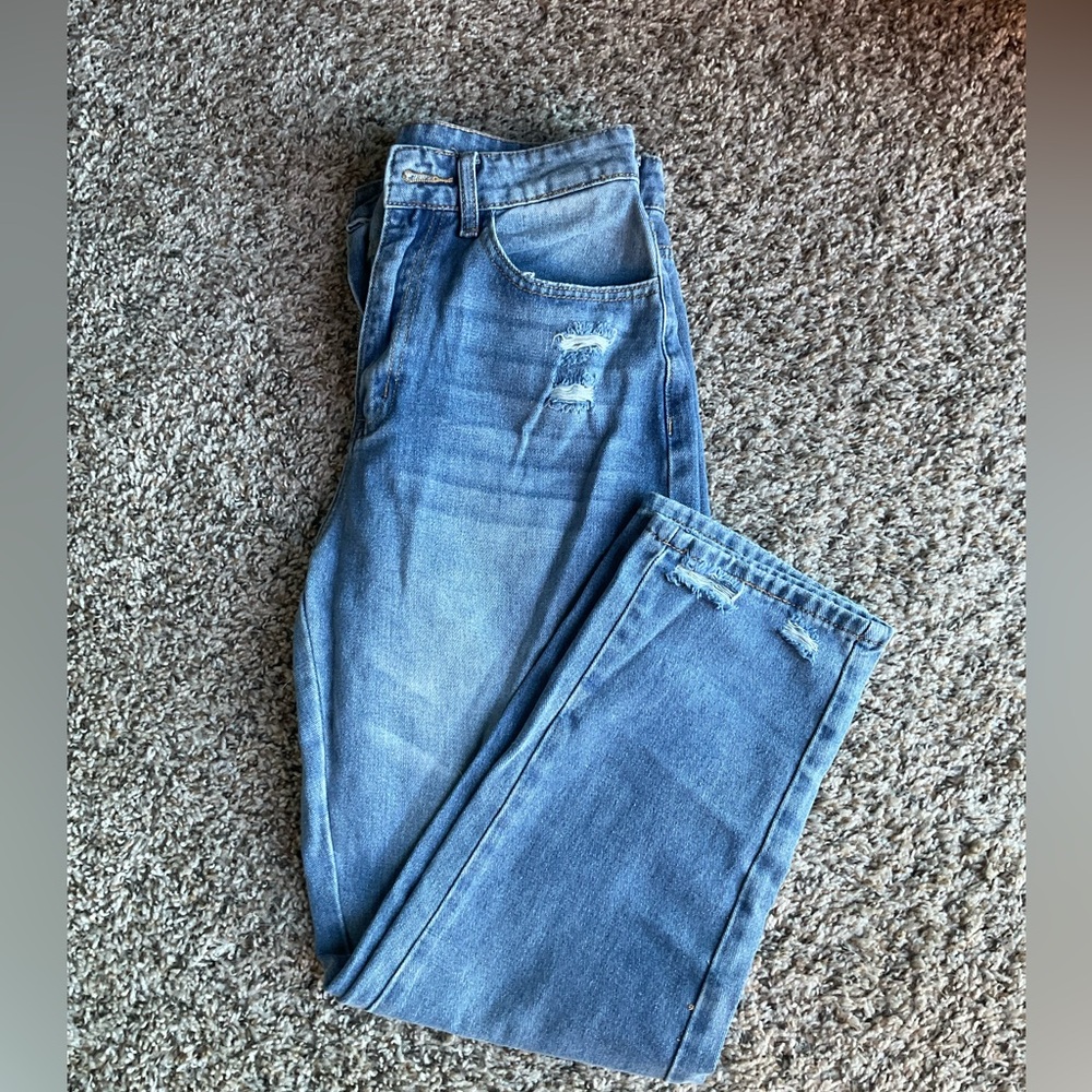 Never worn pair of straight jeans.